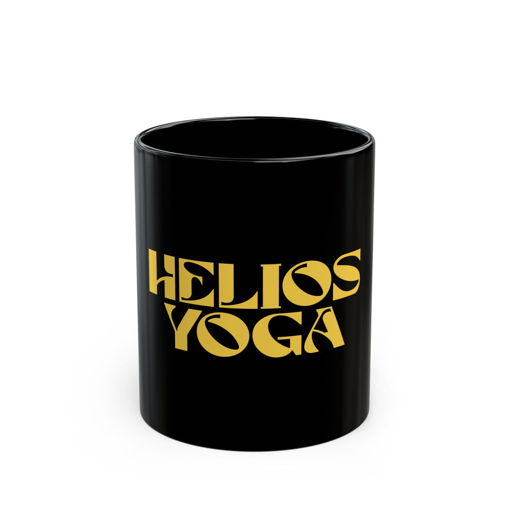 Helios Yoga Black Coffee Mug — Bold Retro Gold Logo (11oz & 15oz)