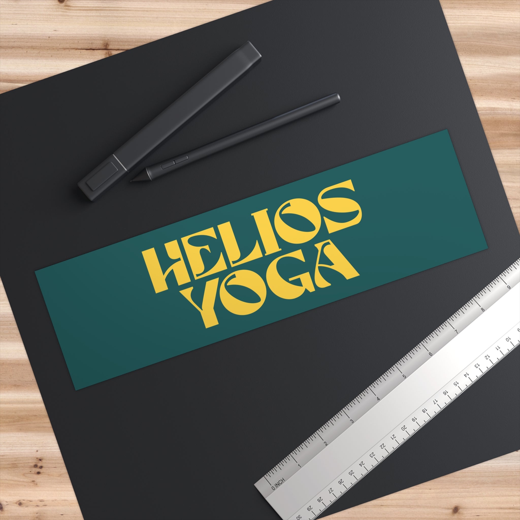 Helios Yoga Bumper Sticker — Retro Yellow Logo on Teal